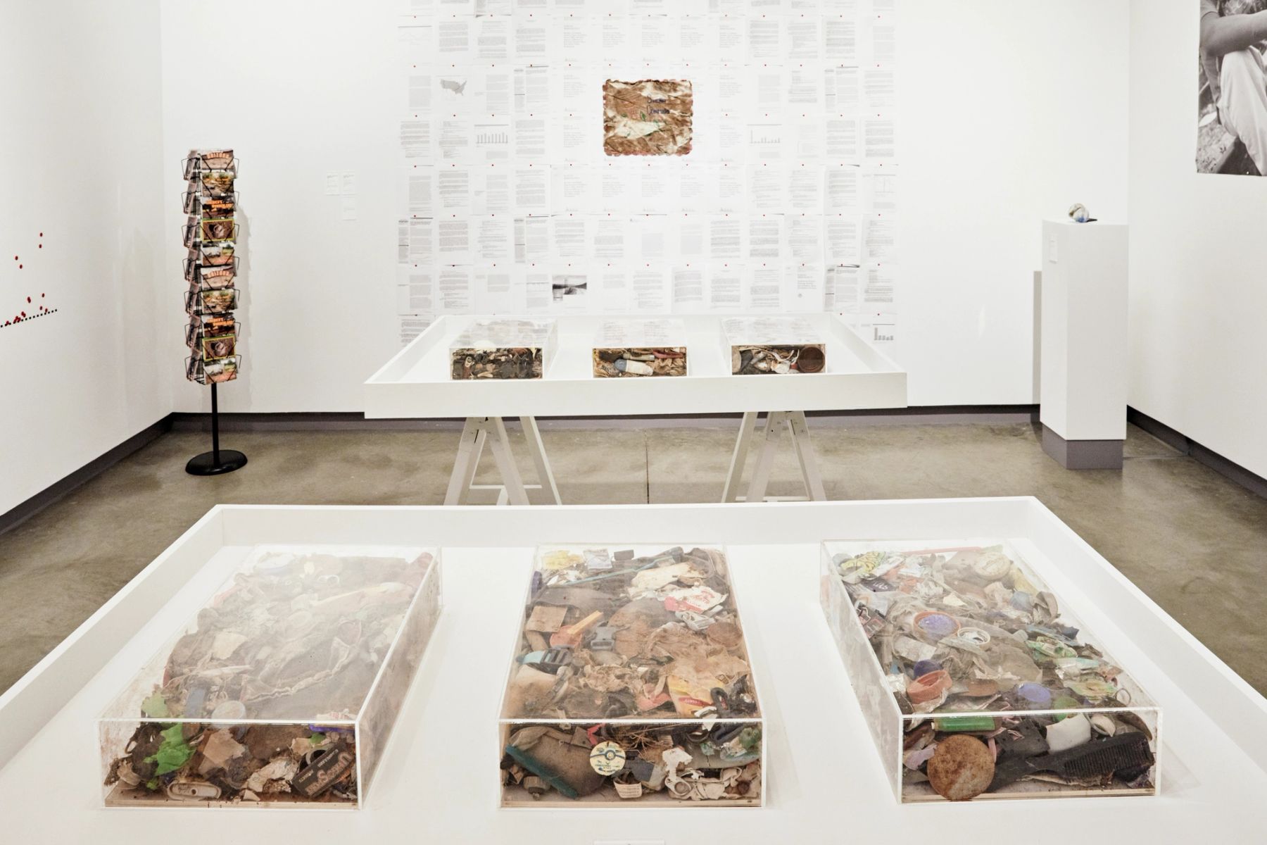Making Migration Visible: Traces, Tracks & Pathways installation view with works by Jason De León, Michael Wells, and Lucy Cahill.