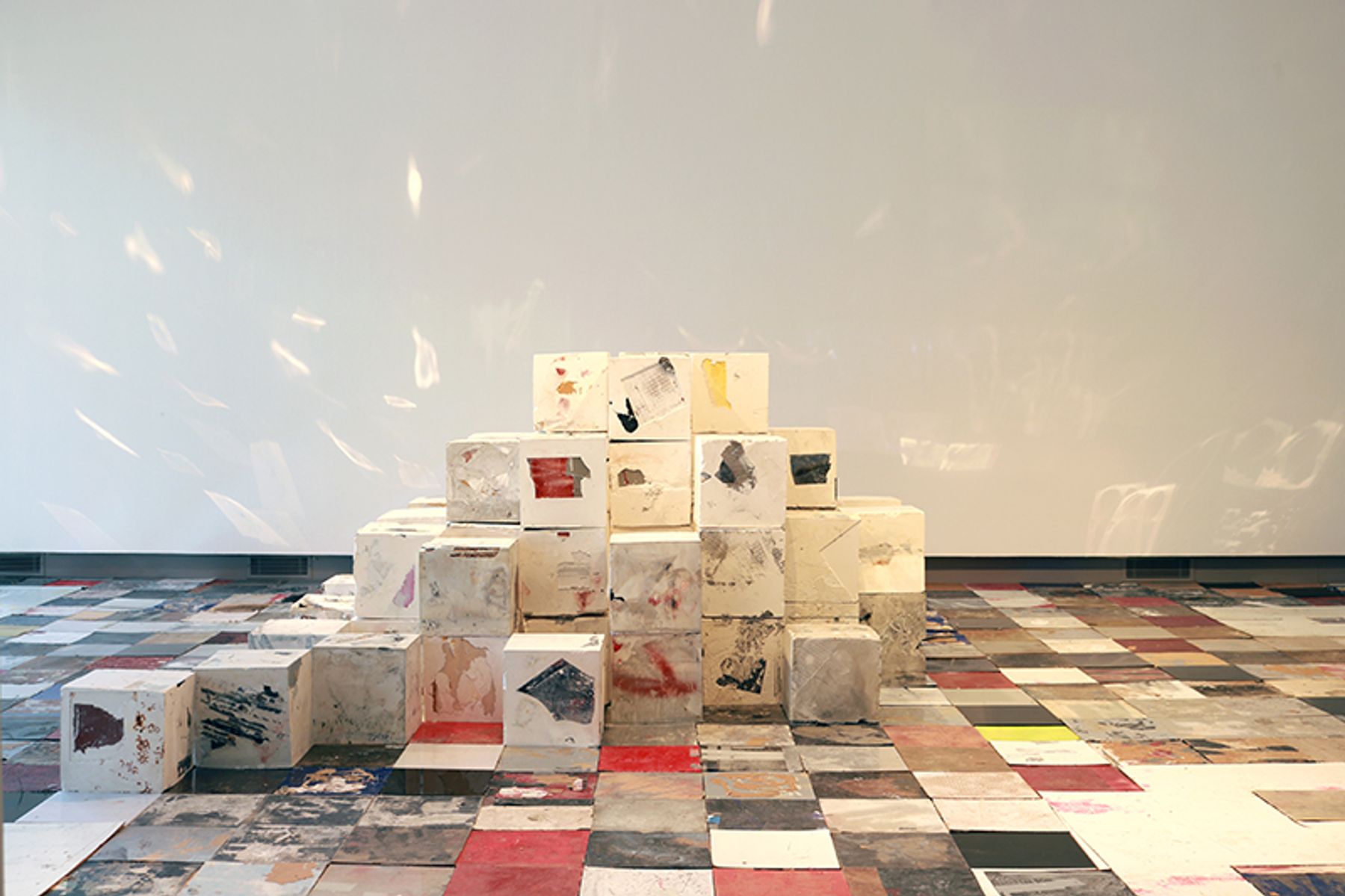 Off the Wall installation view with work by Ryan Wallace.