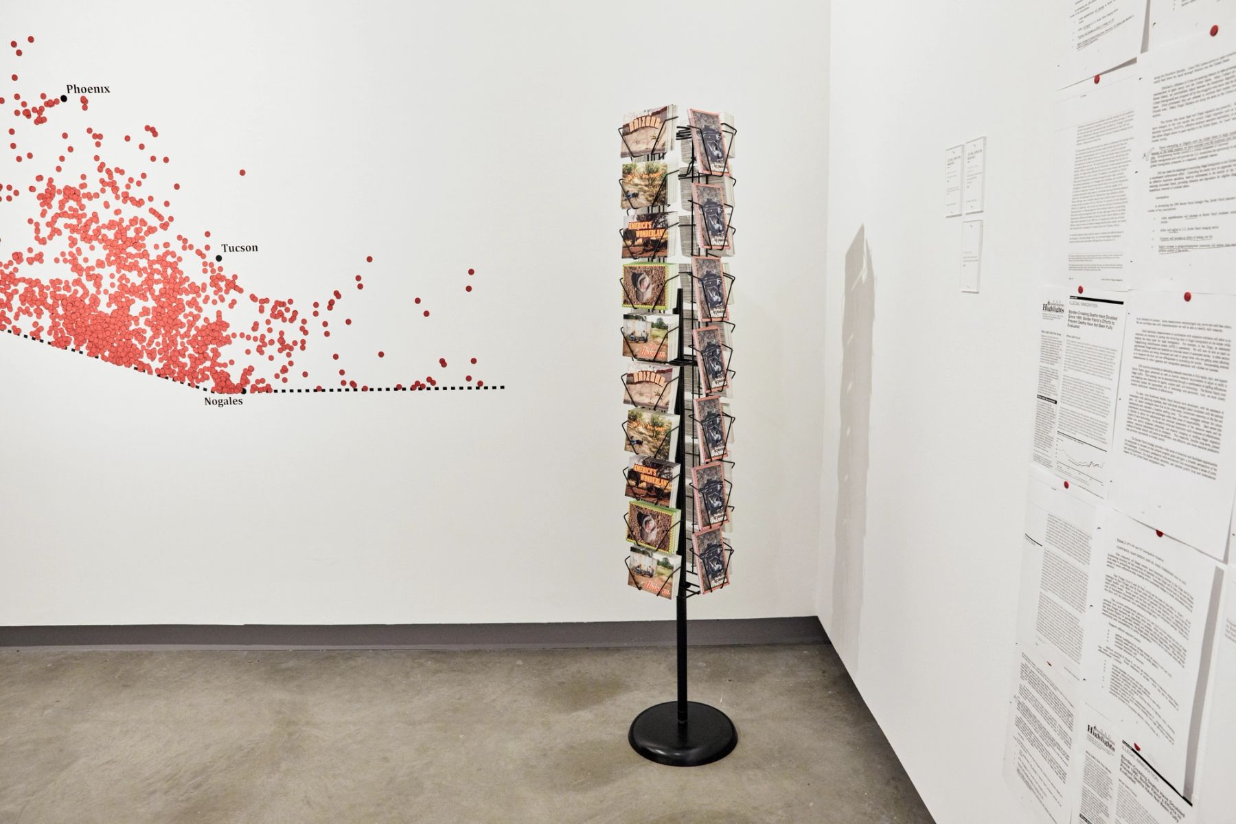 Making Migration Visible: Traces, Tracks & Pathways installation view with works by Jason De León, Michael Wells, and Lucy Cahill.