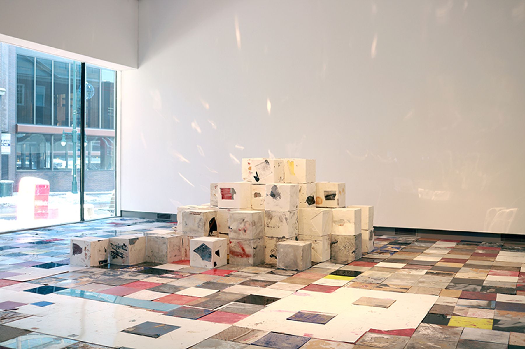 Off the Wall installation view with work by Ryan Wallace.