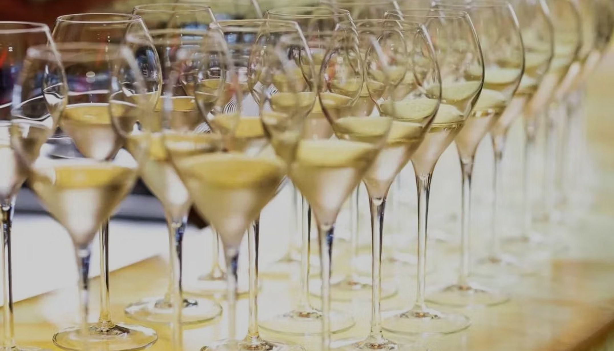 Champagne flute glasses filled with Champagne