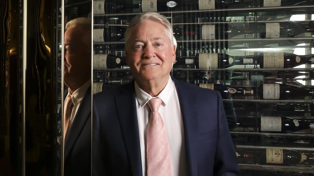 ANTHONY JOHN IN FRONT OF CELLAR