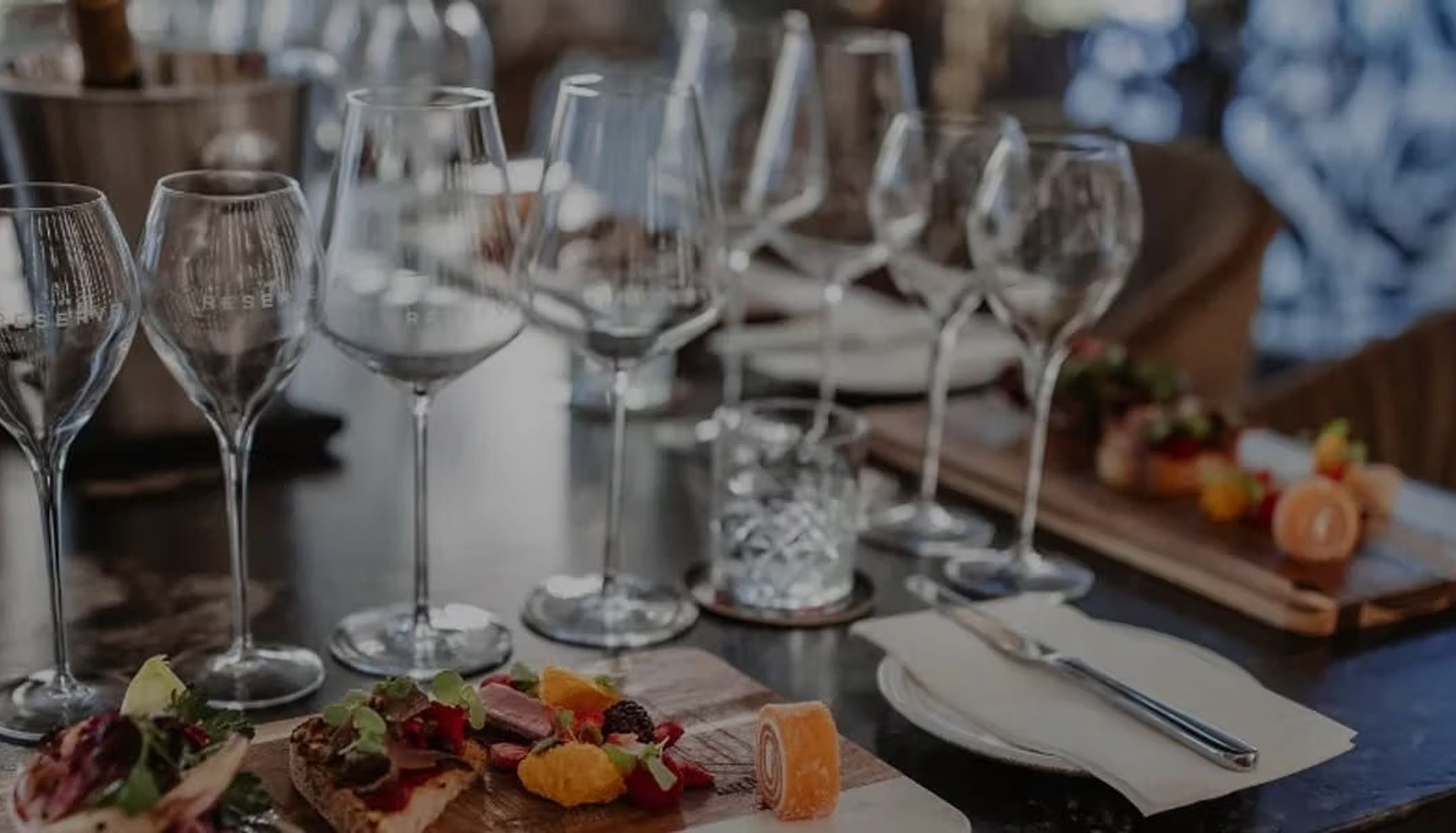 Wine glasses with food board and cutlery