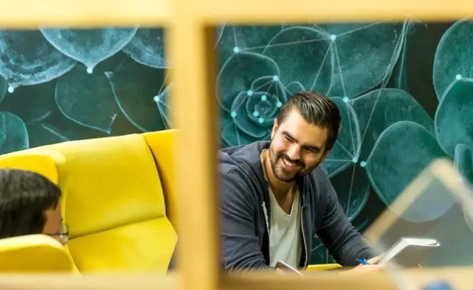 sales person having meeting casually with prospect