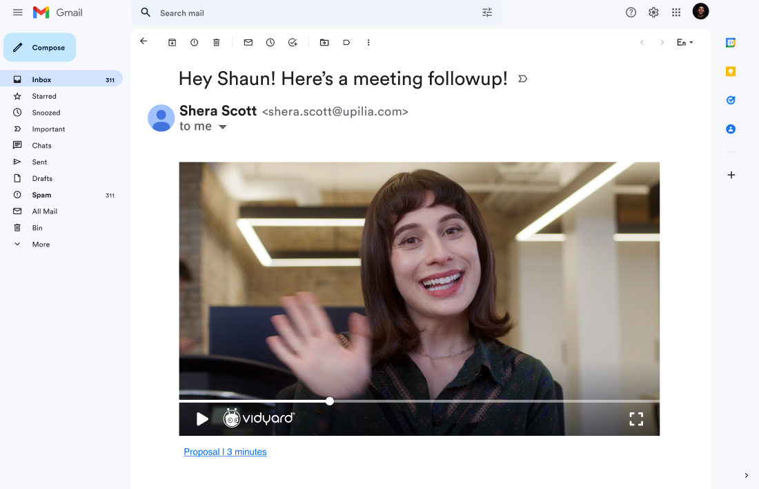 a gmail email with a video of a woman waving