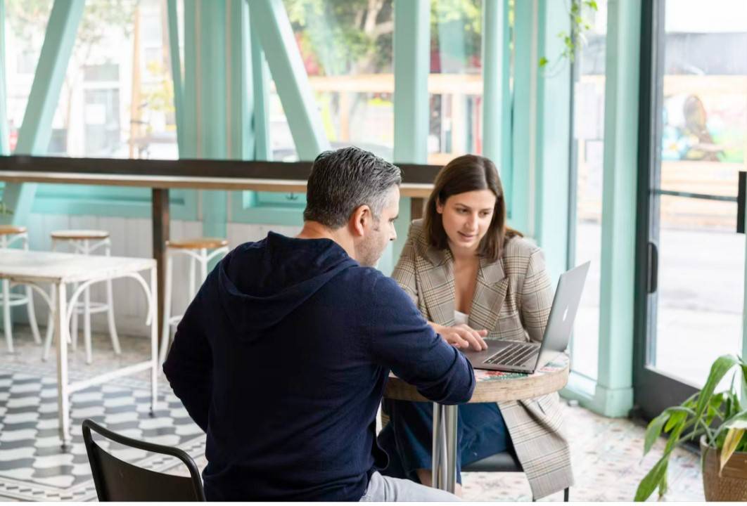 one person consulting another person
