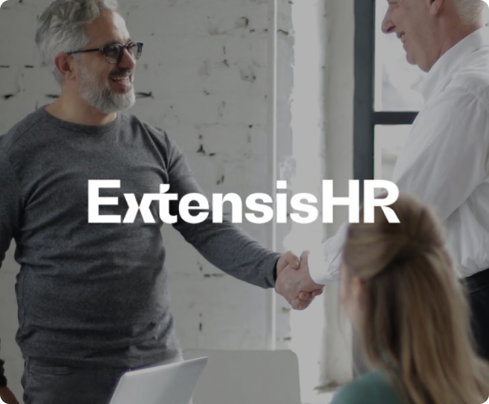 ExtensisHR text over two men shaking hands.