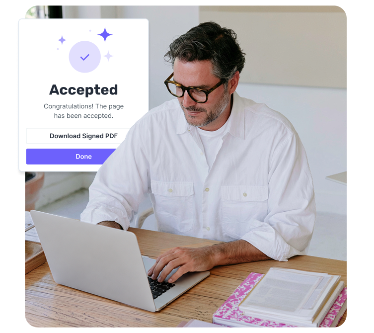 A man uses a laptop displaying an 'Accepted' pop-up with a 'Download Signed PDF' button.
