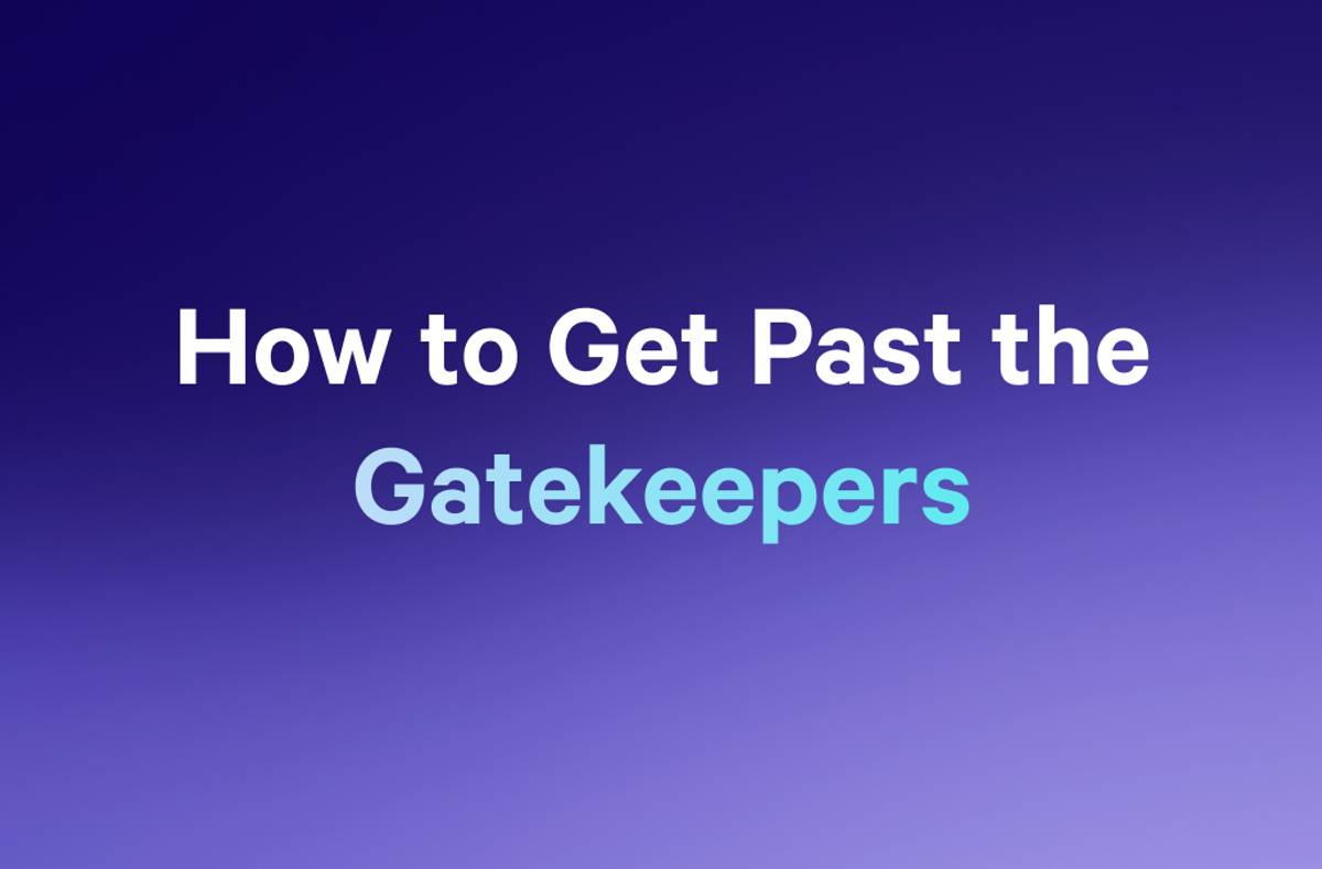 a woman is sitting at a desk talking on a telephone .