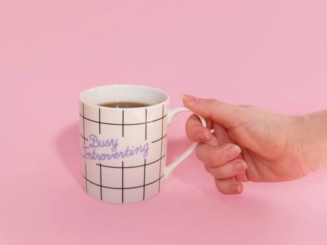  busy introverting on a mug