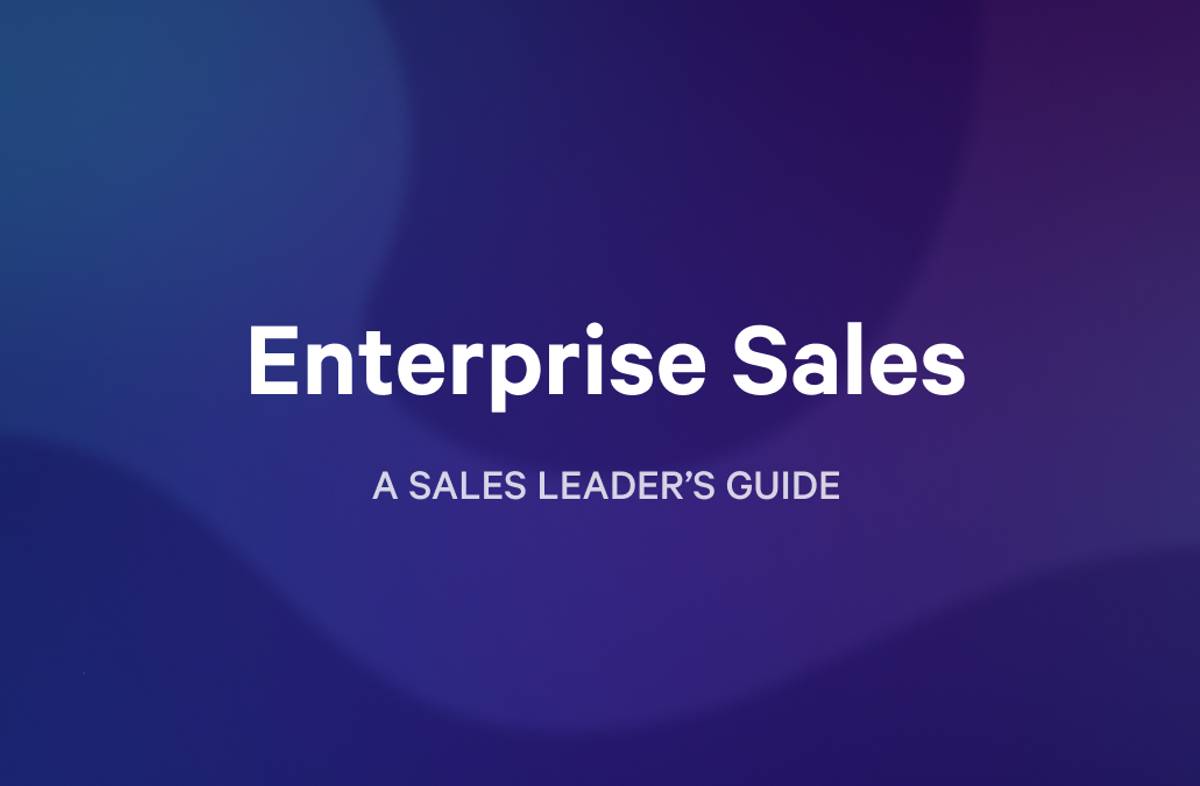 Enterprise AE speaking to an executive team with an important report in the background 