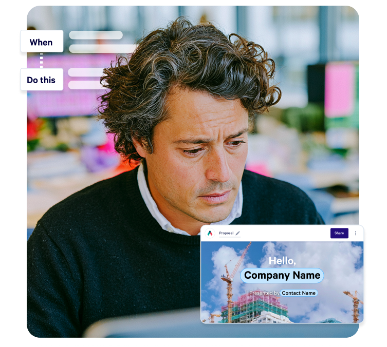 A man views a computer screen displaying workflow elements and a digital proposal with a construction site background.