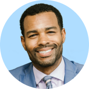 Headshot of a smiling sales leader