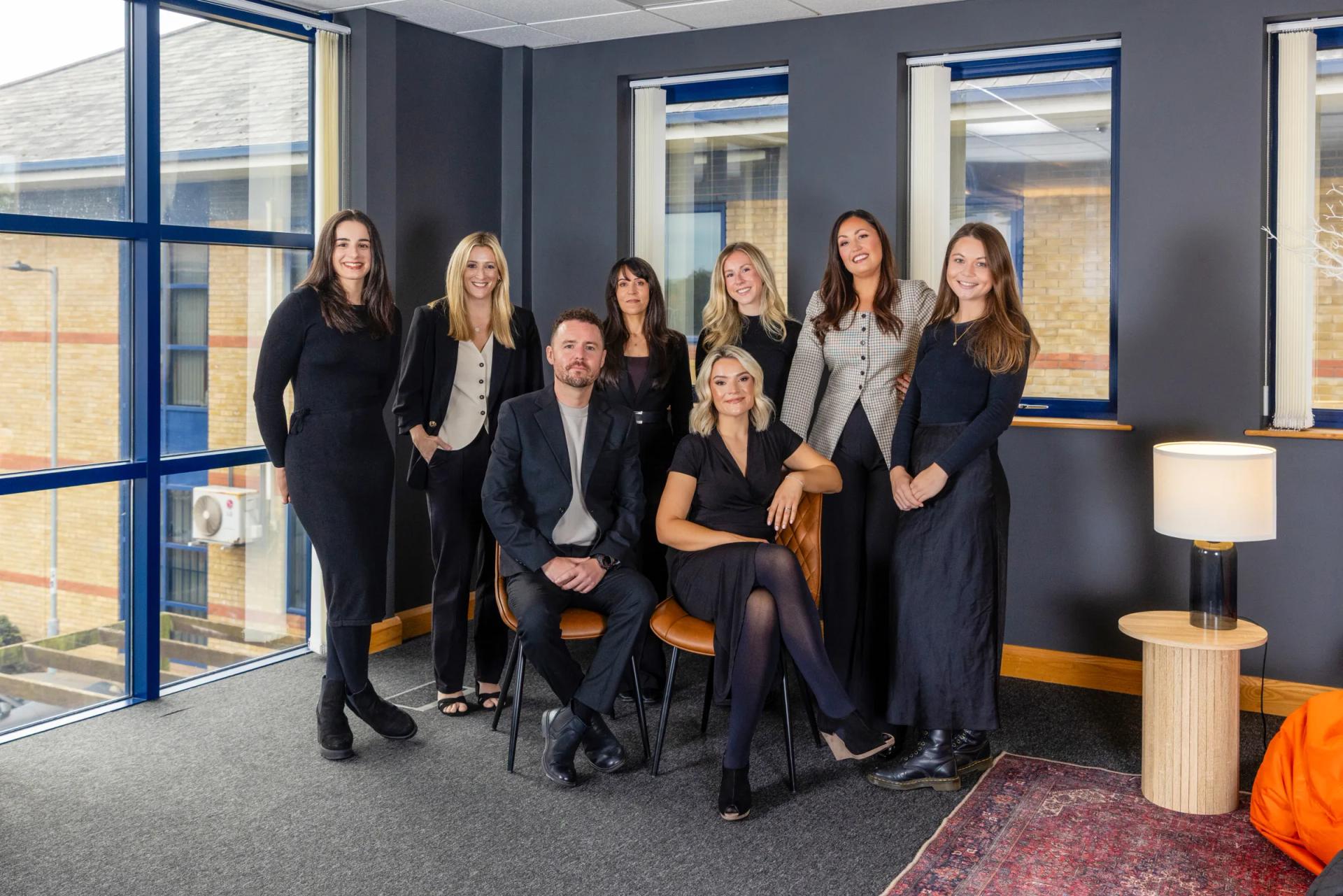 The Qualia Law team together in the office