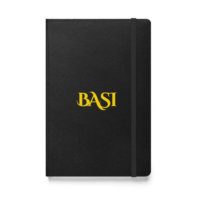 Black hardcover notebook with the gold BASI wordmark on the cover
