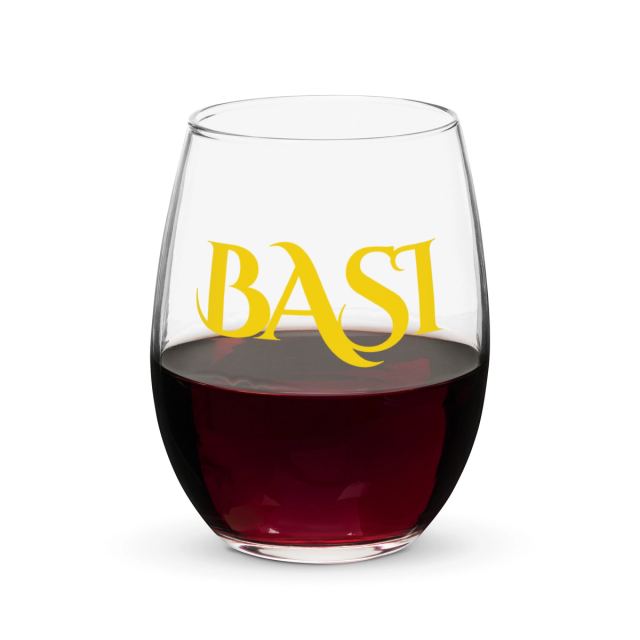 Stemless wine glass with red wine and the gold BASI wordmark