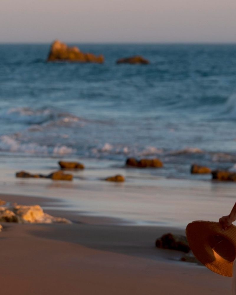 Woman enjoying Alicante while the sunset's happening