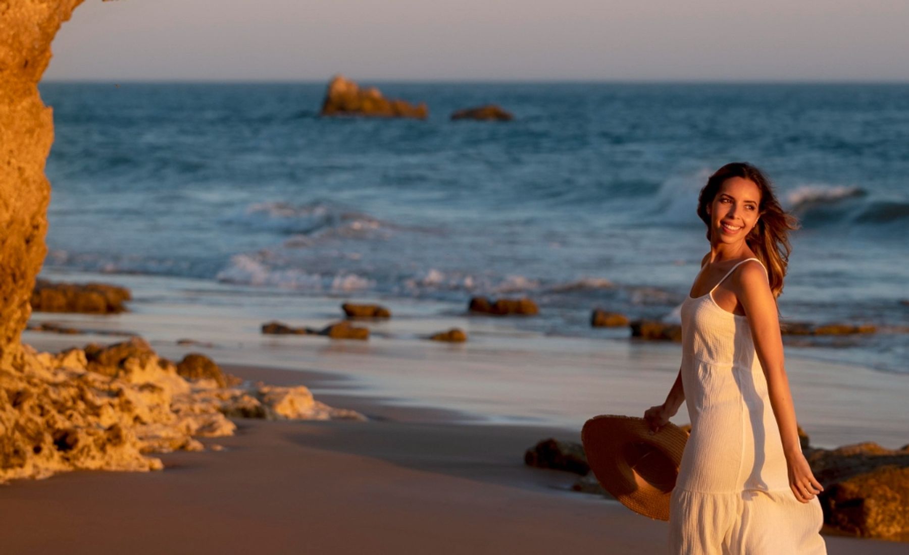 Woman enjoying Alicante while the sunset's happening