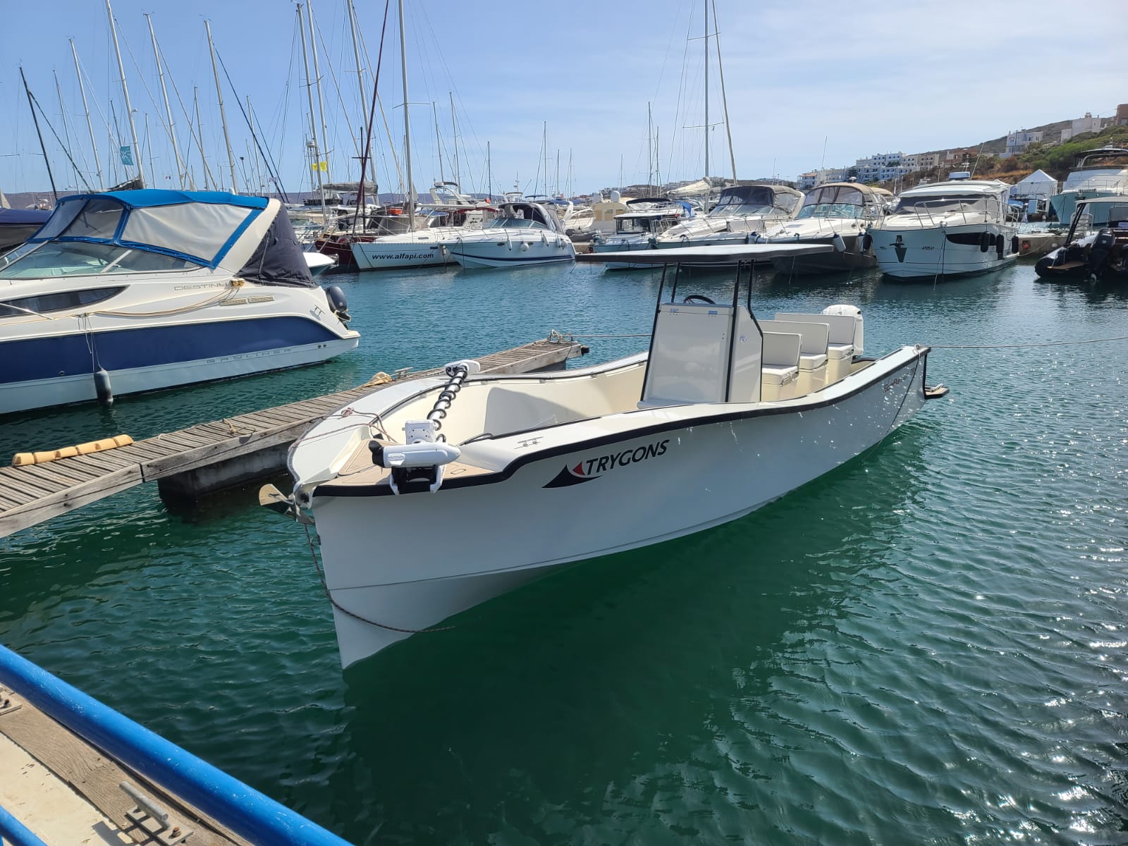 EcoRunner 78 moored at a marina pontoon