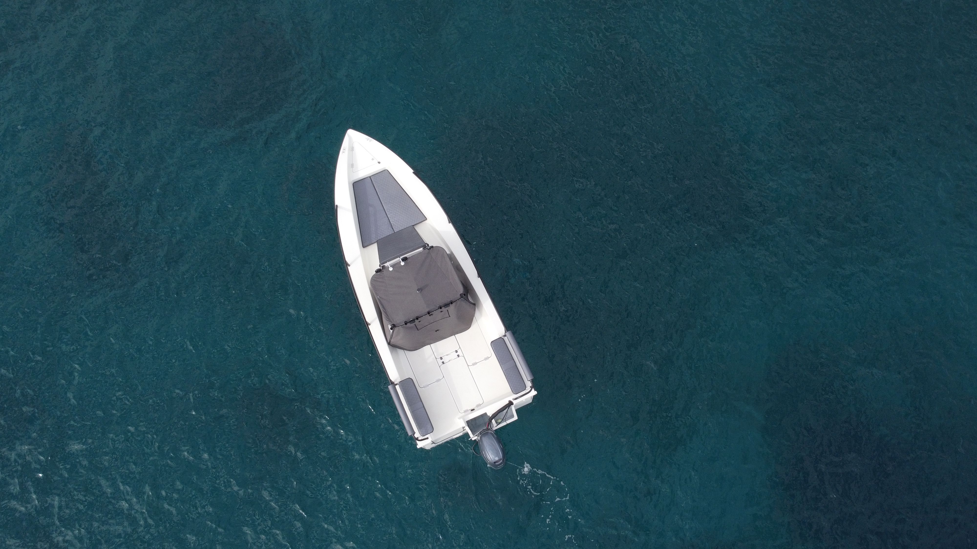 EcoRunner 59 Gen2, straight-down aerial view, stationary, clean deck layout