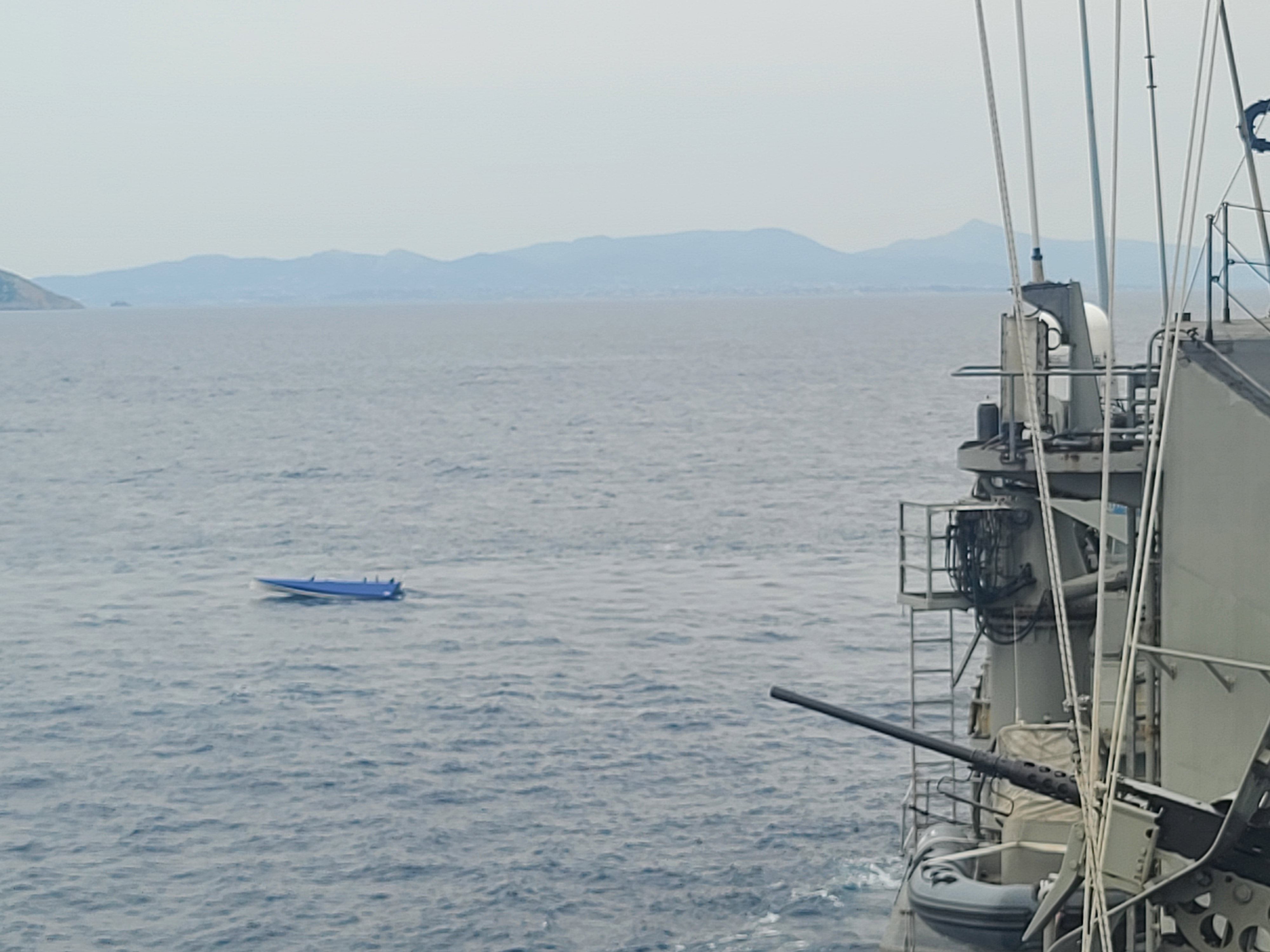 Close-up of a sensor mast on the USV hull with partner technology labels