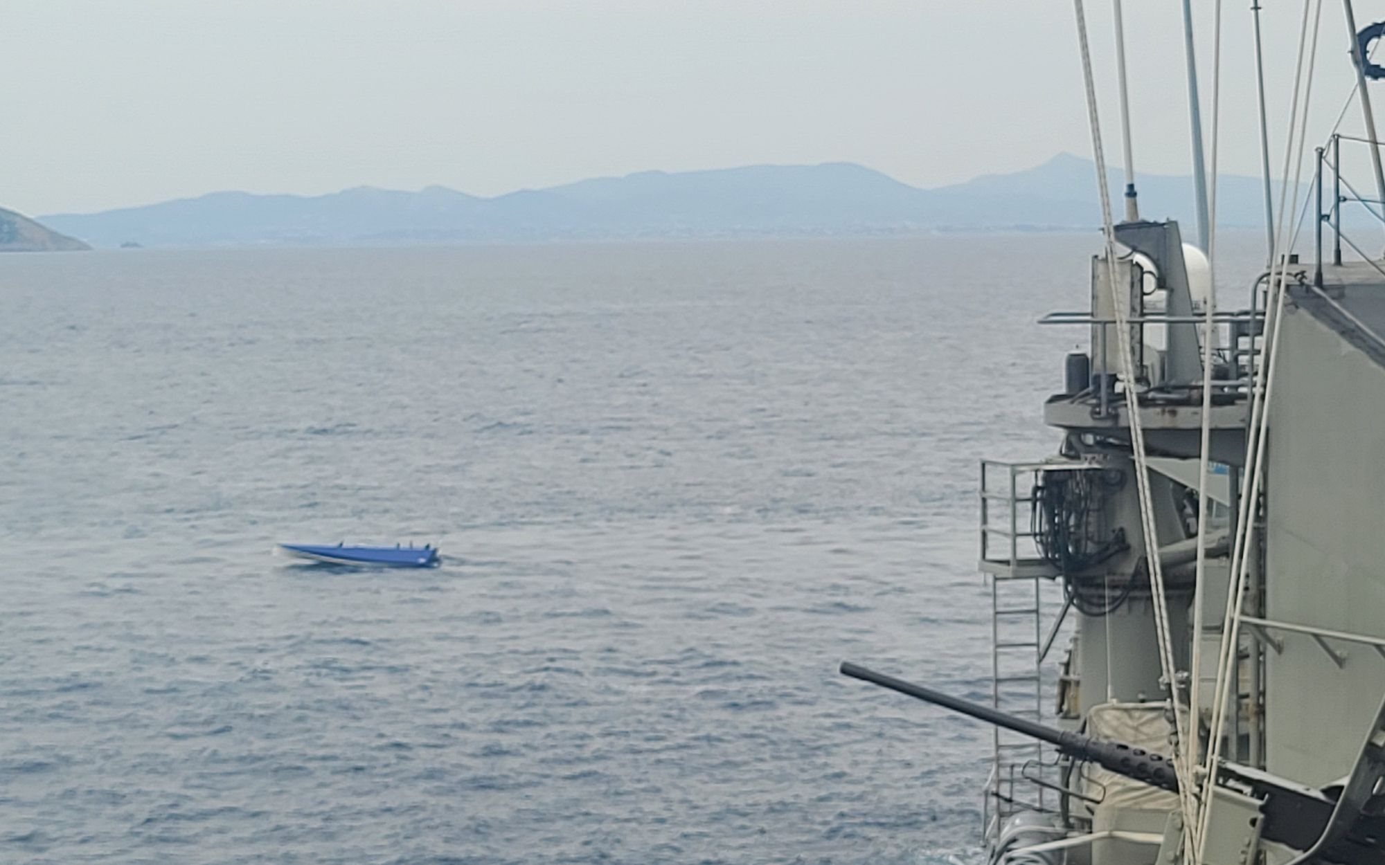 Close-up of a sensor mast on the USV hull with partner technology labels