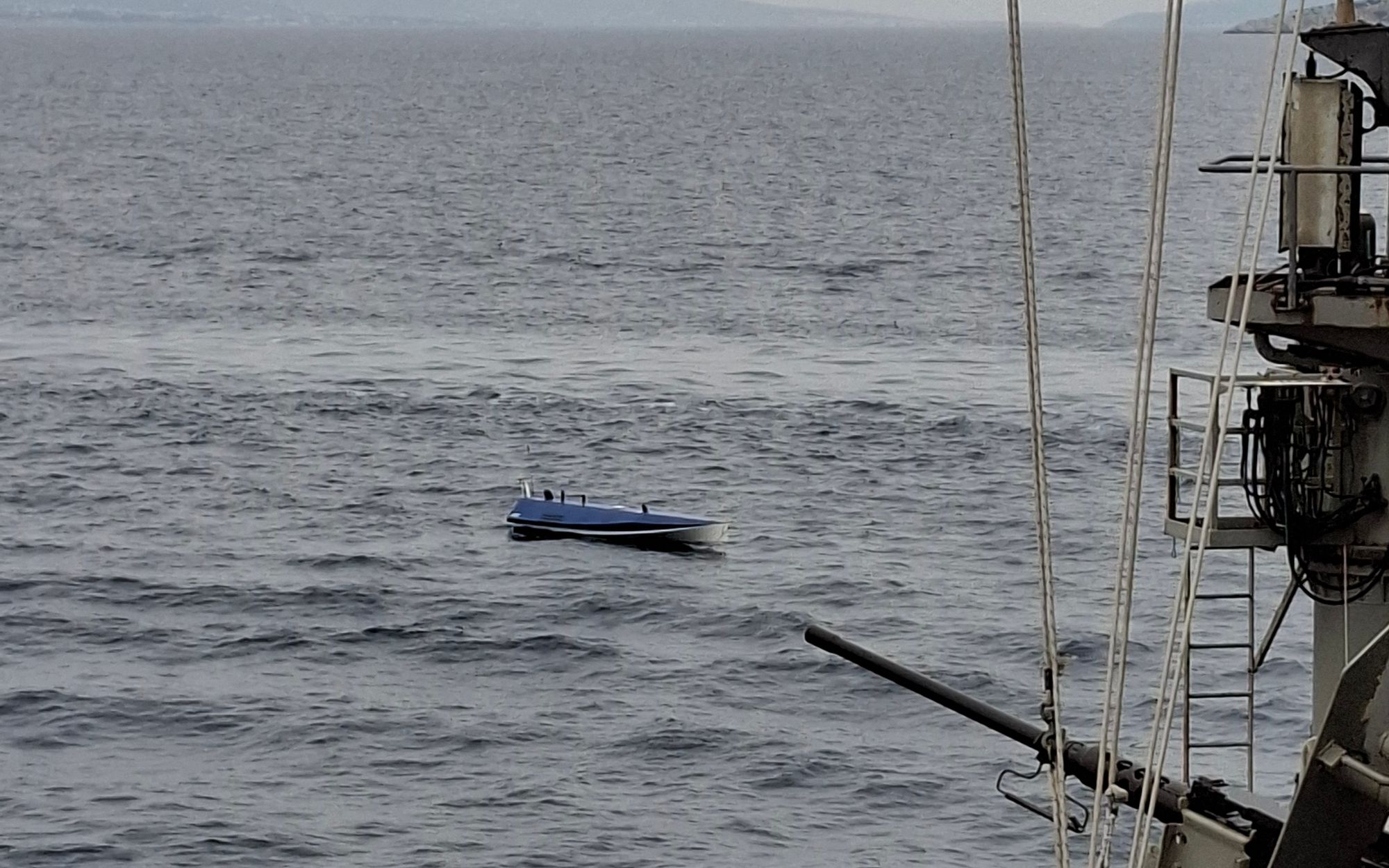 Control station showing a live onboard video feed and a LIDAR point-cloud display during a USV trial