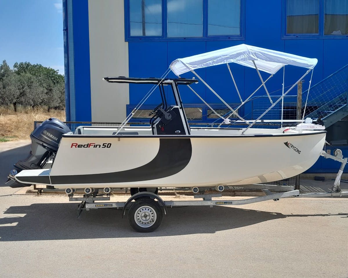 RedFin 50 on its trailer with the bimini sun canopy deployed