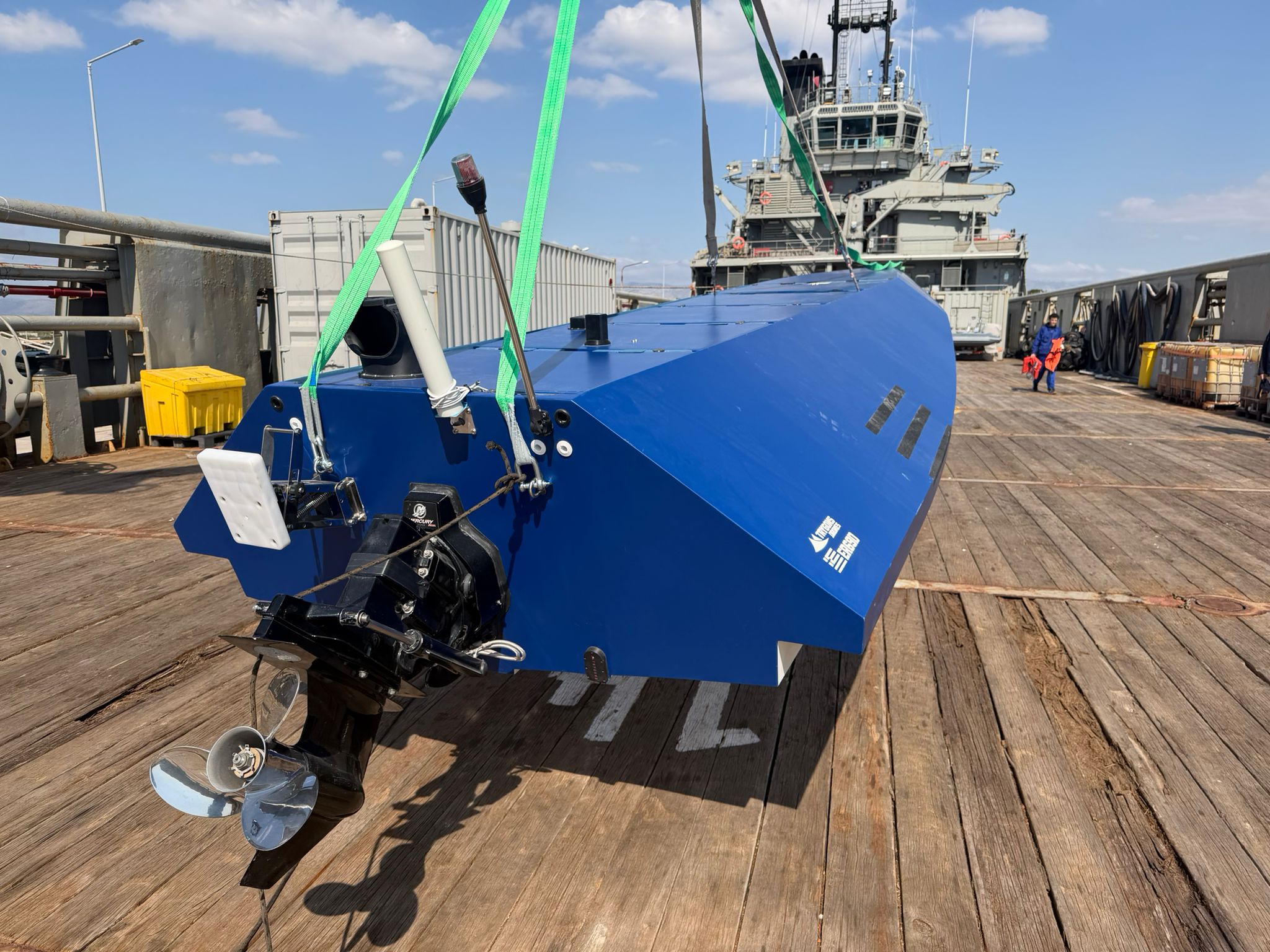 ER69D lifted by ship crane onto a Hellenic Navy vessel, real TRYGONS DRONES photography