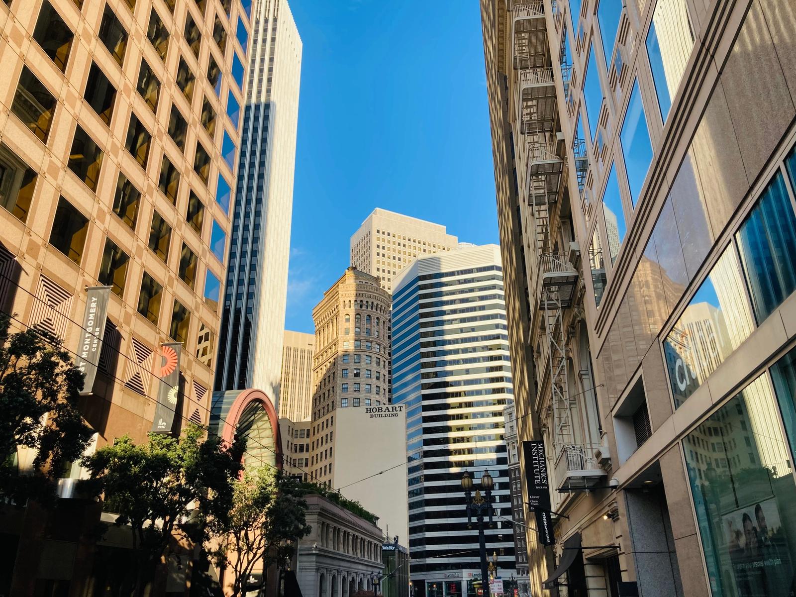 Large and tall buildings against a blue sky