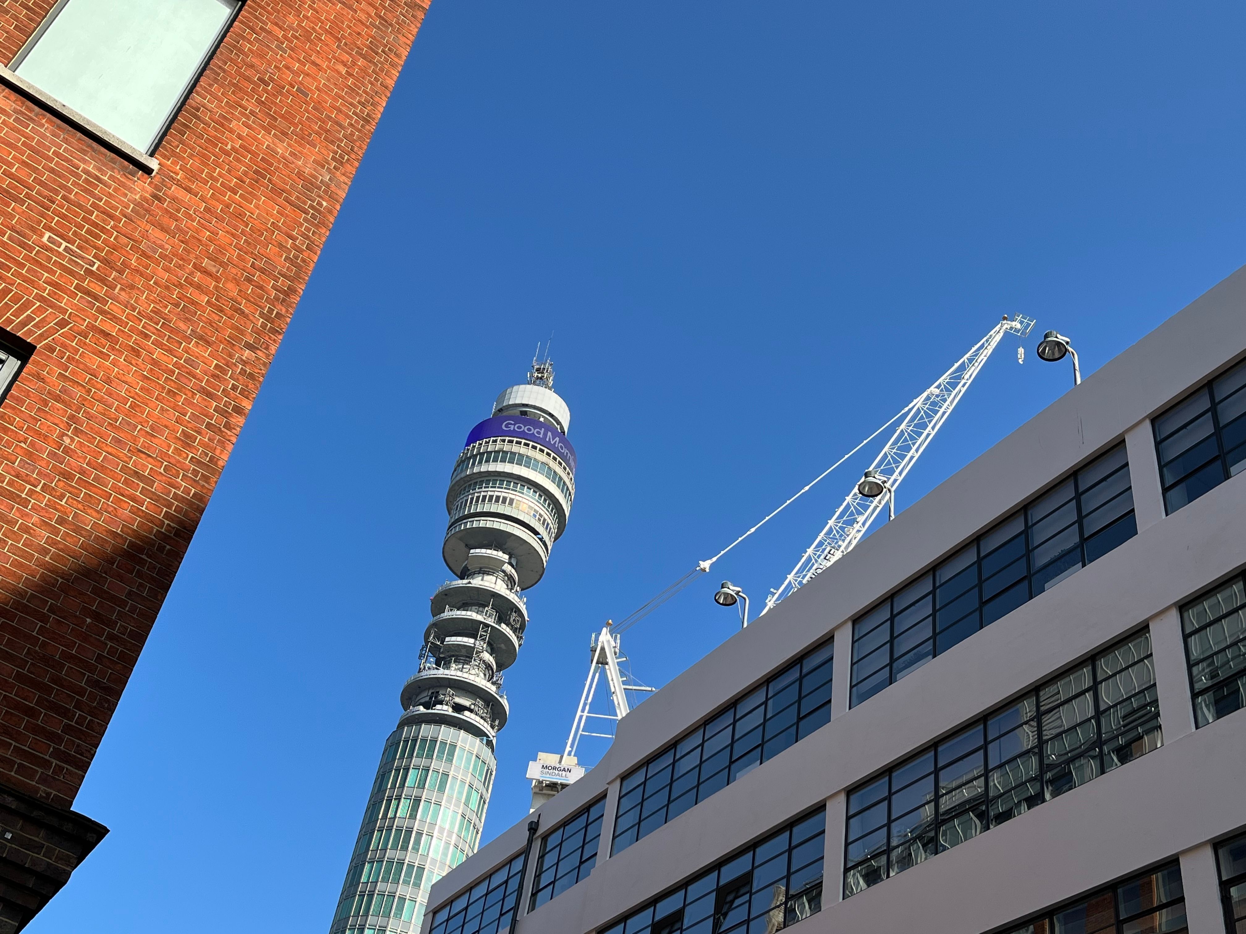 BT tower with backdrop ofbright blue sky