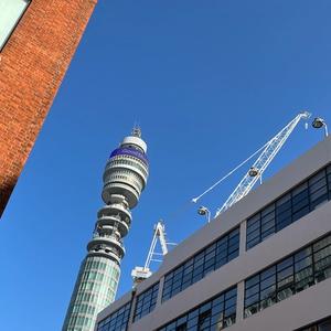 BT tower with backdrop ofbright blue sky