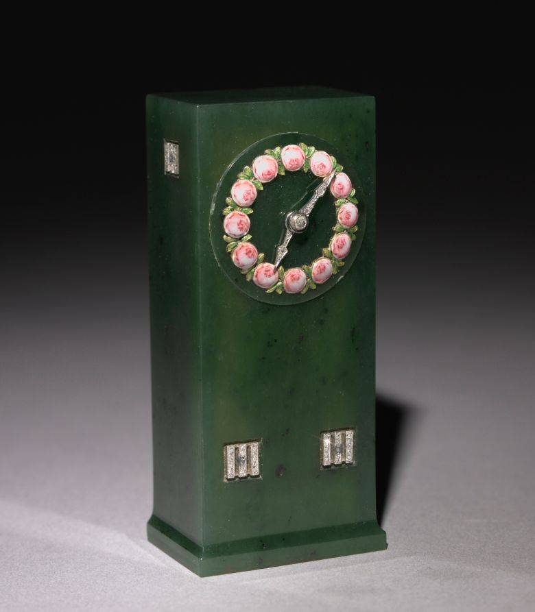 Pendule en bronze et laiton, XXe siècle
