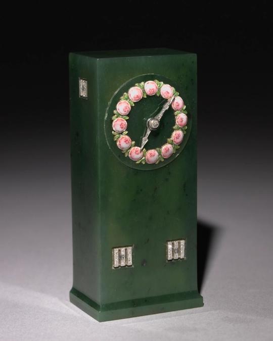 Pendule en bronze et laiton, XXe siècle