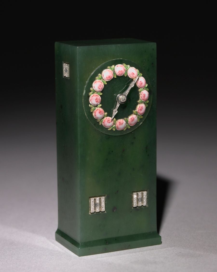 Pendule en bronze et laiton, XXe siècle