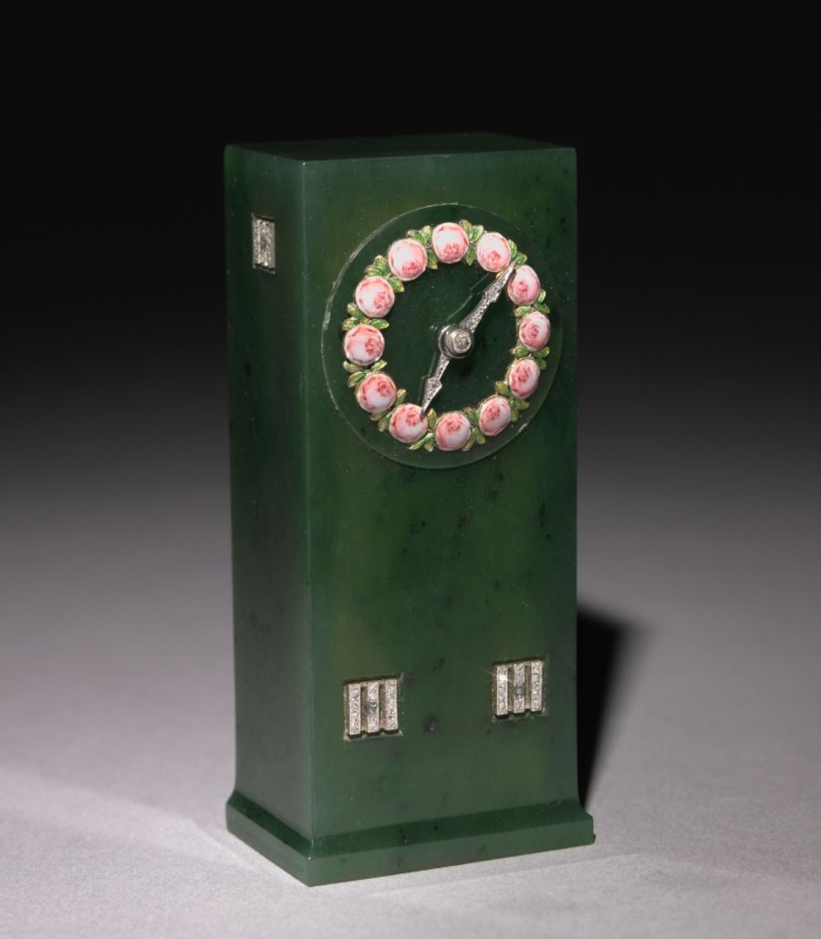 Pendule en bronze et laiton, XXe siècle