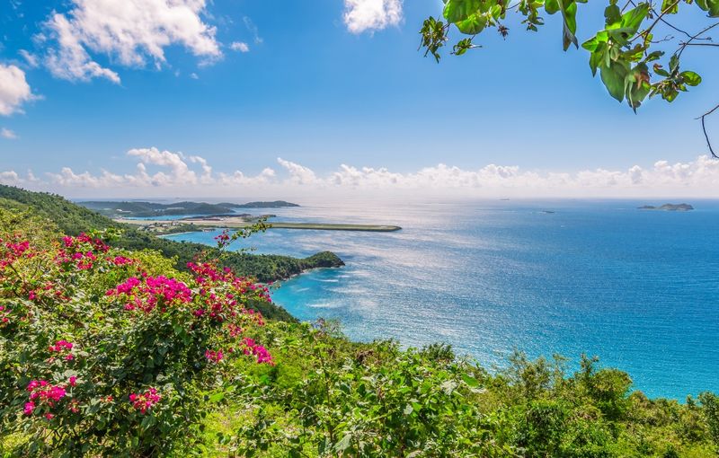Saint Thomas, US Virgin Islands. Brewers bay and Perseverance Bay. On the background airport strip in the ocean.