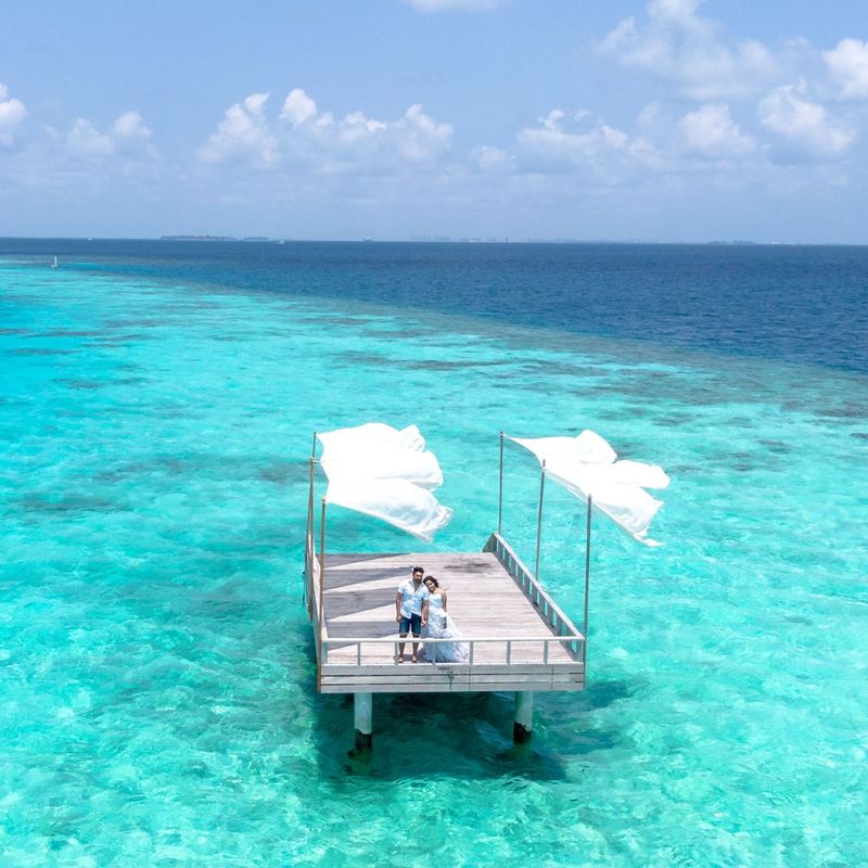 White Boat on Blue Sea Under Blue Sky