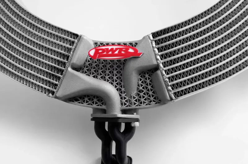 Tube and fin core with 3D printed tanks manufactured out of CP1 alloy by PWR