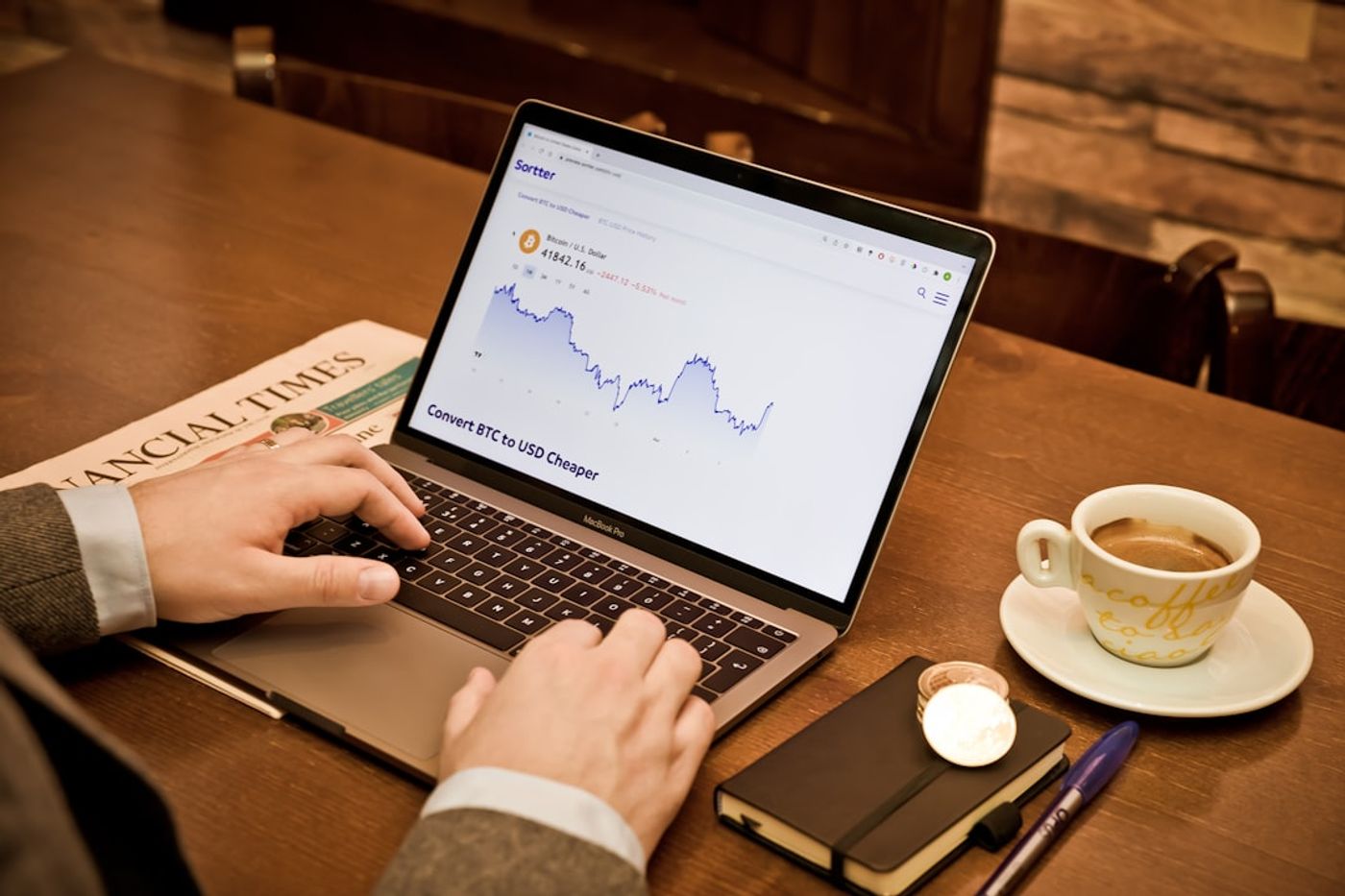 Marketer reviewing a spreadsheet lead tracker and Reddit discussion notes
