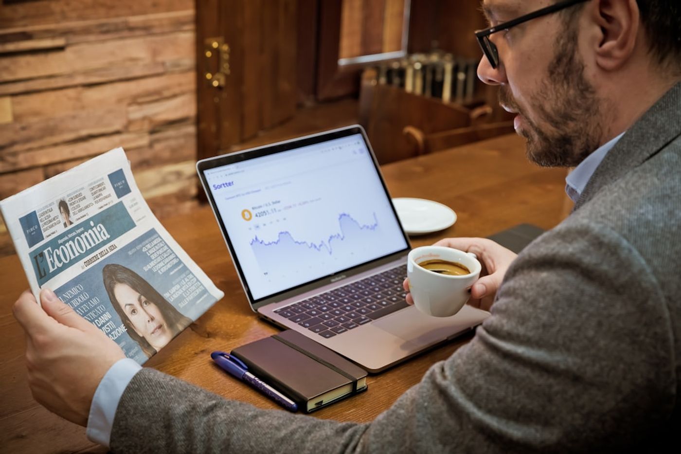 founder reviewing a marketing report with a checklist on paper