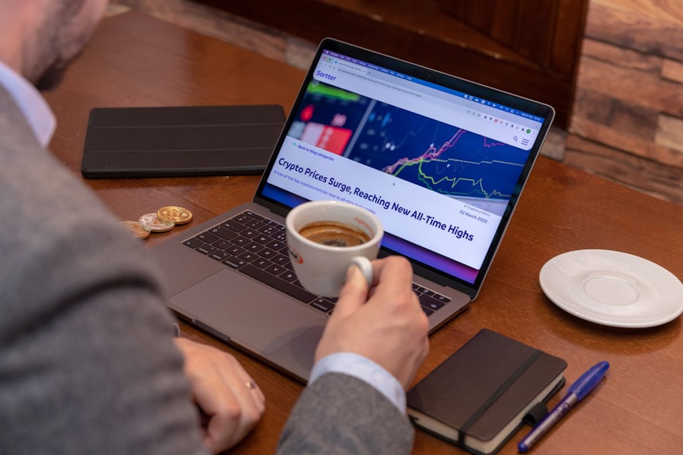 Marketer reviewing an analytics dashboard with demand signals and funnel metrics