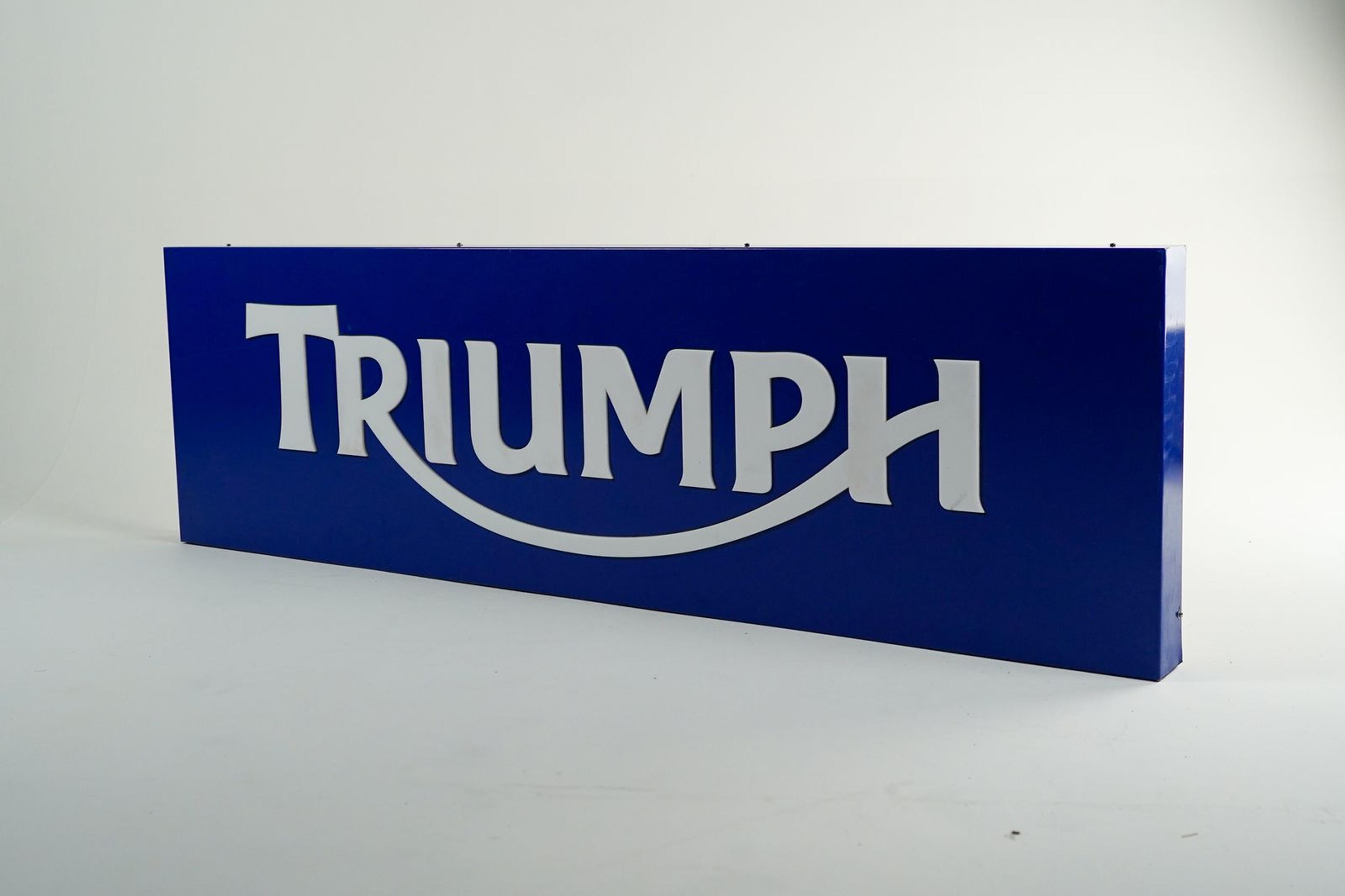 Triumph Wall Sign - Angle view