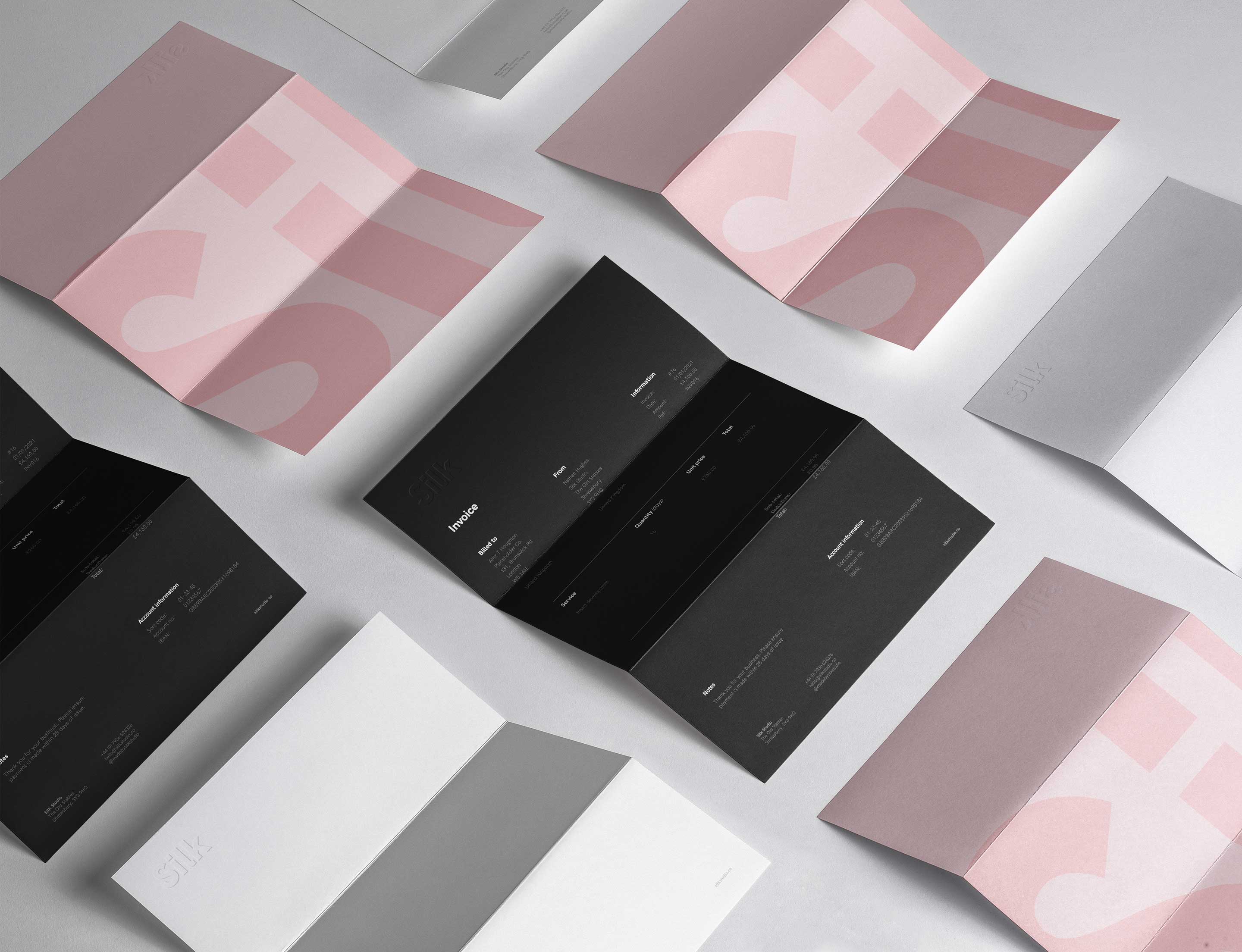 Silk Studio branded paper, letterheads and invoices on a white studio background.