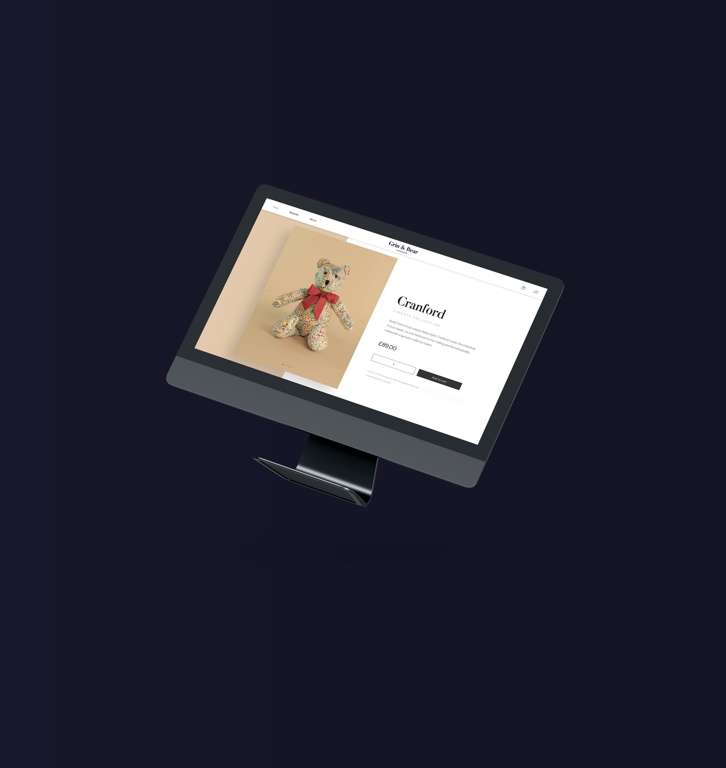 A floating iMac with the Grin & Bear London website product page.