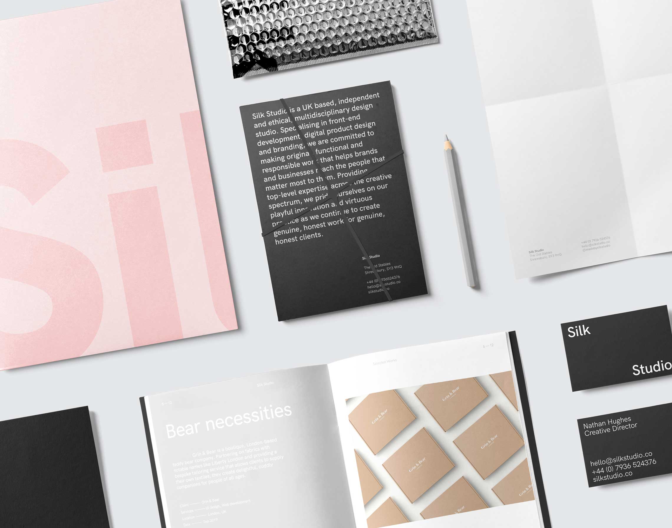 Silk Studio branded stationary in a studio.