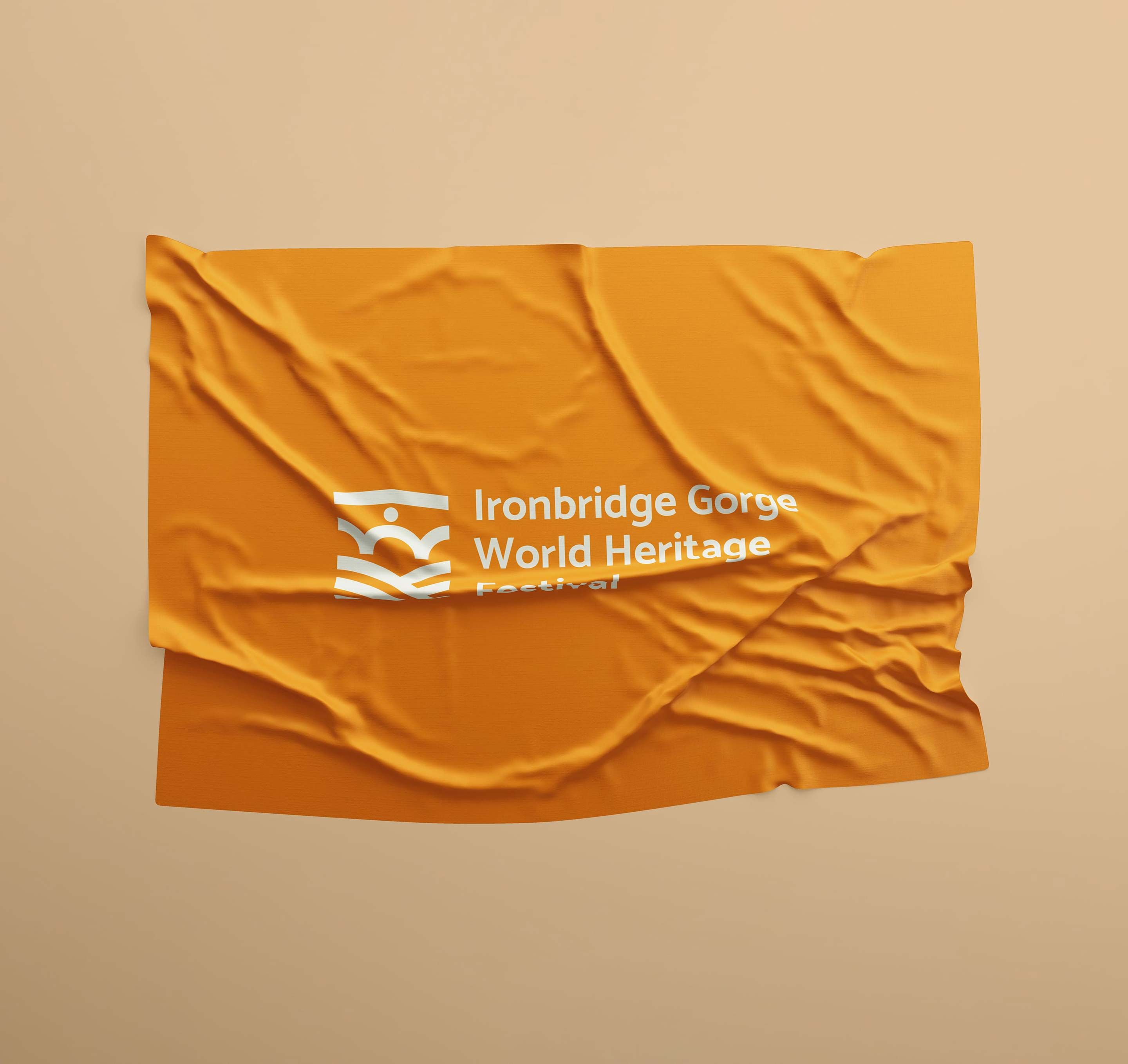 An Ironbridge Gorge World Heritage Festival flag with logo print design by Silk Studio.