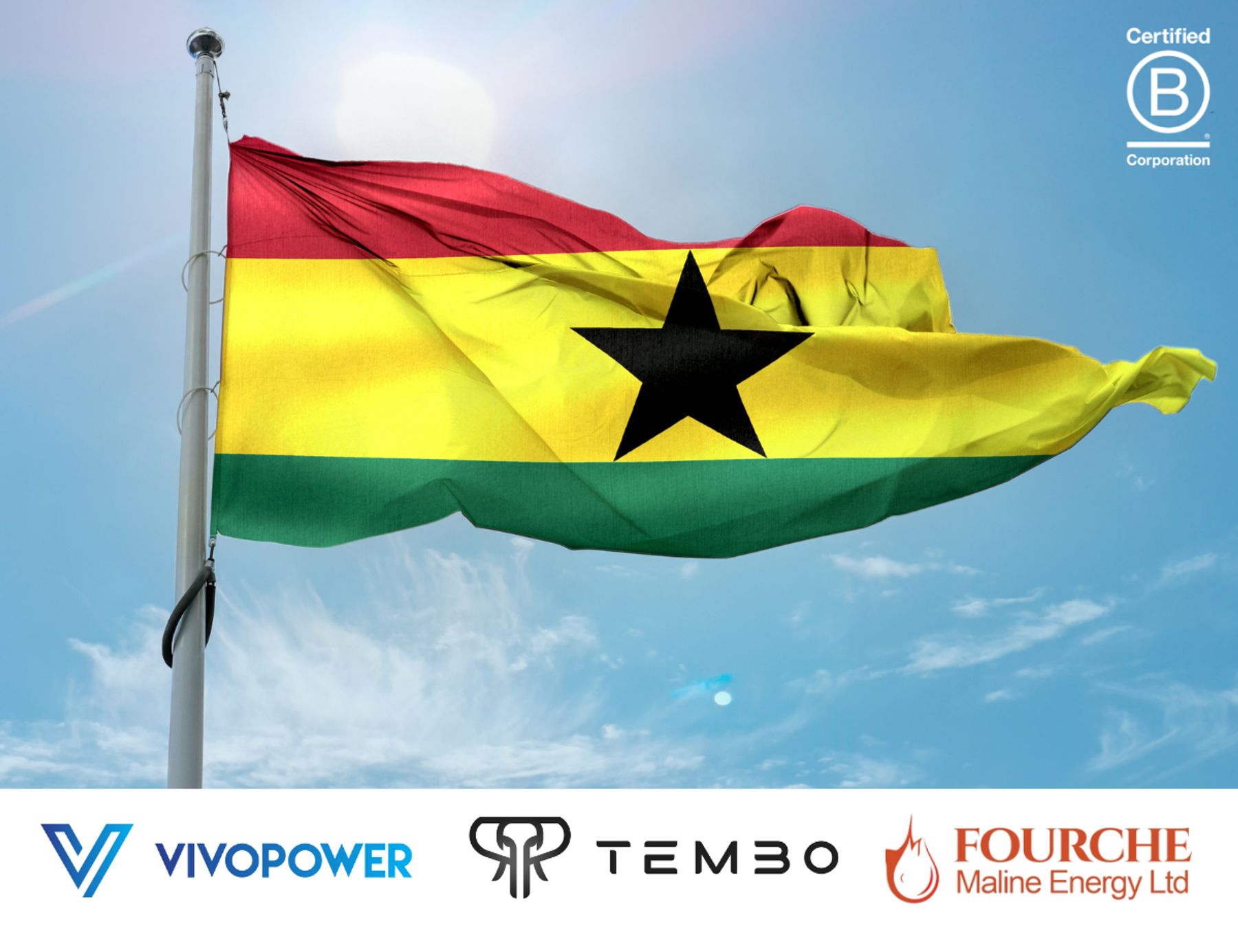 Ghanaian flag flying against a blue sky, with VivoPower, Tembo and Fourche Maline Energy logos