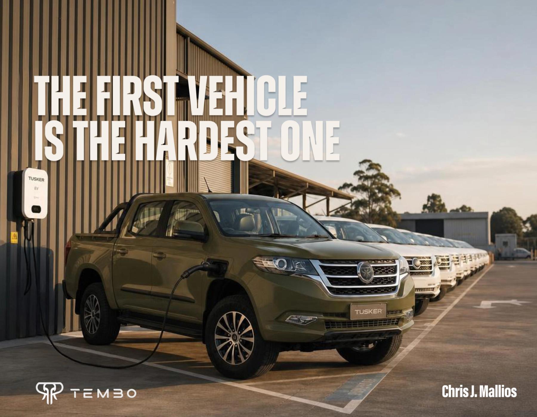 'The first vehicle is the hardest one' header: green Tembo Tusker charging at a depot beside a row of white Tuskers