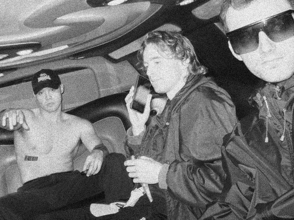 Members of Shady Nasty pose in the back of a limousine.